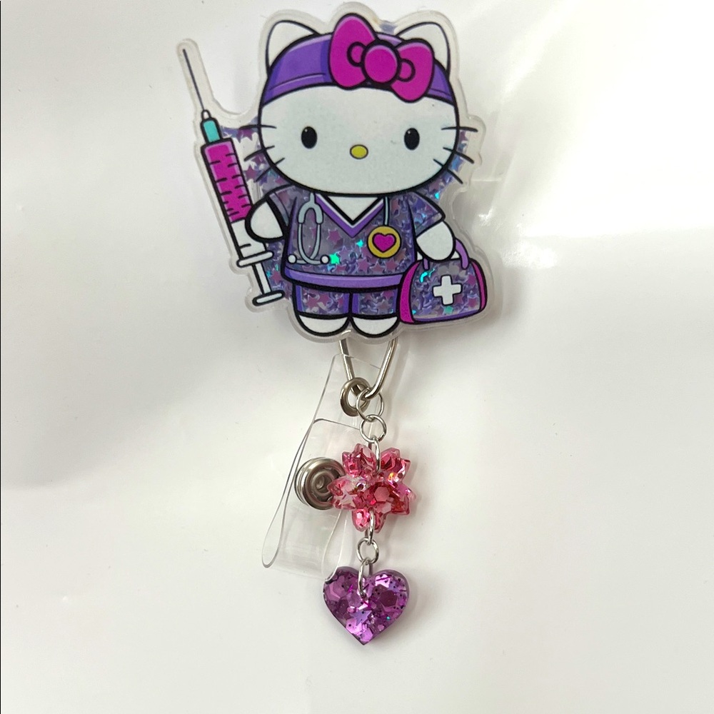 New Hellokitty Purple and Pink Nurse-Themed shaker Badge Reel with charms